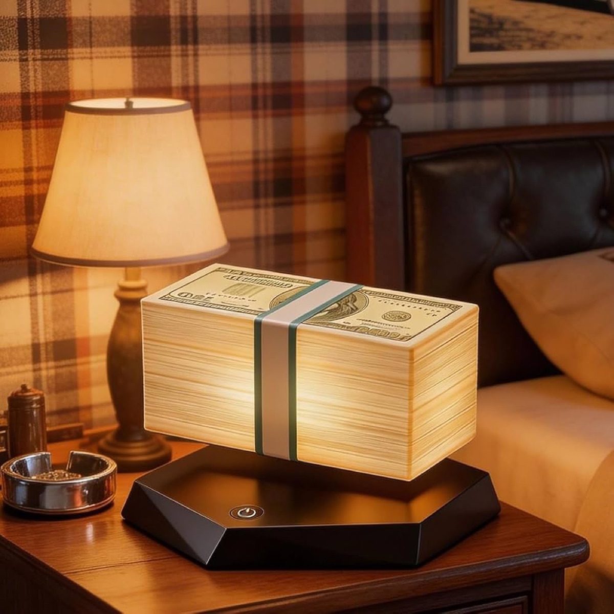 Floating money lamp glowing warmly on a bedside table